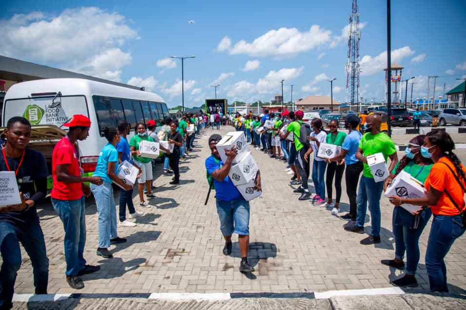 Man running to finish with boxes